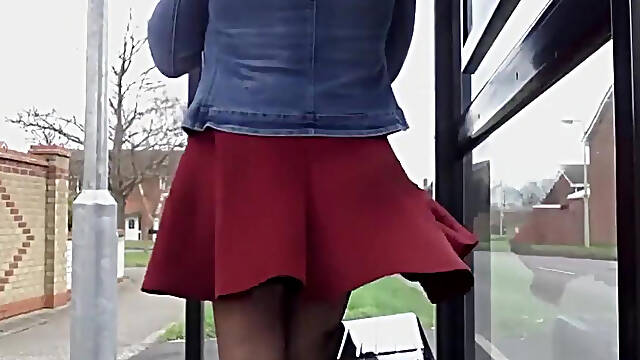 WINDY DAY AT THE BUS STOP