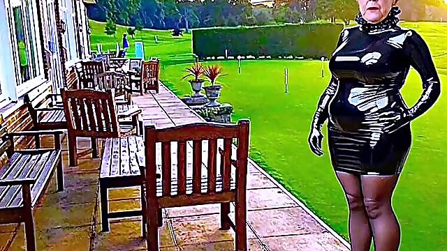 Cathy Shiny PVC Skirt High Heels Parading on Golf Club Patio
