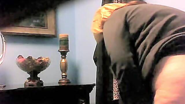 Fatty granny gets on the toilet spy cam with cellulites ass