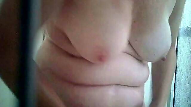 My wife loves to masturbate with the shower head and I love her hairy pussy