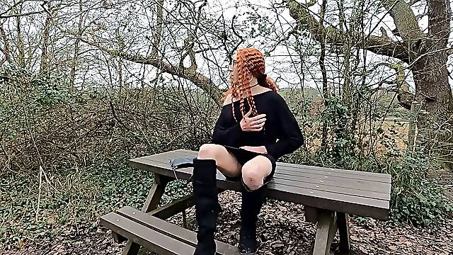 Redhead trans girl flashes her ass