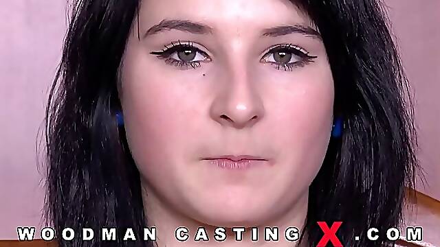 Adorable brunette with green eyes is sucking dick during a porn video casting, to show her skills