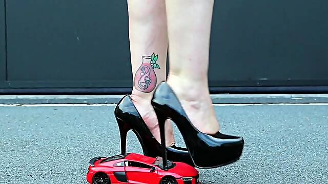 Italian MILF dominates in stilettos crushing toy car under her heel