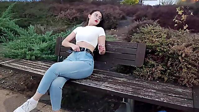 Brunette babe with big booty shows off her round ass in tight jeans