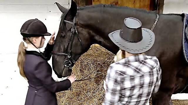 Lesbian Babes Have Fun Eating One Another Out In The Stable