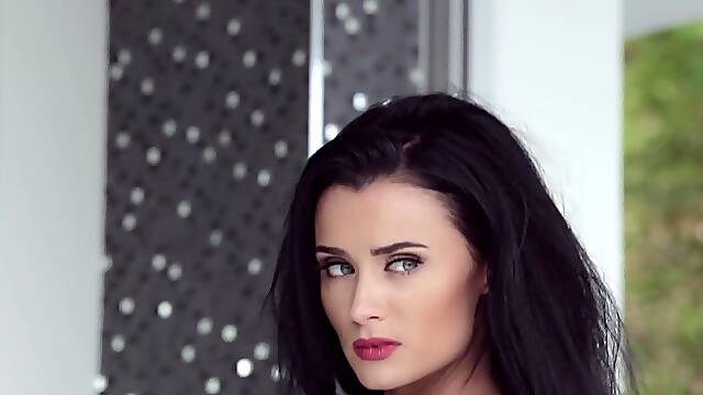 Black-haired Russian chick taking off her sexy undies