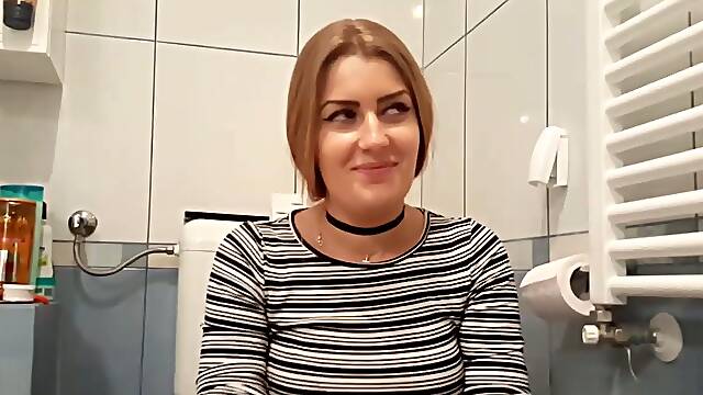 Horny girlfriend getting fucked from behind in a bathroom