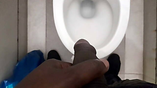 In the hotel bathroom, pissing hot and jerking off