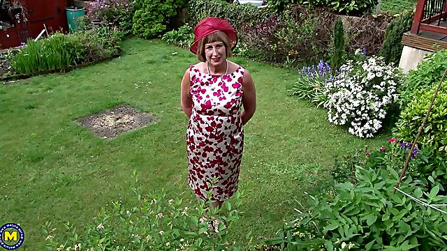 Mature granny Rosemary strips outdoors and plays with a dildo